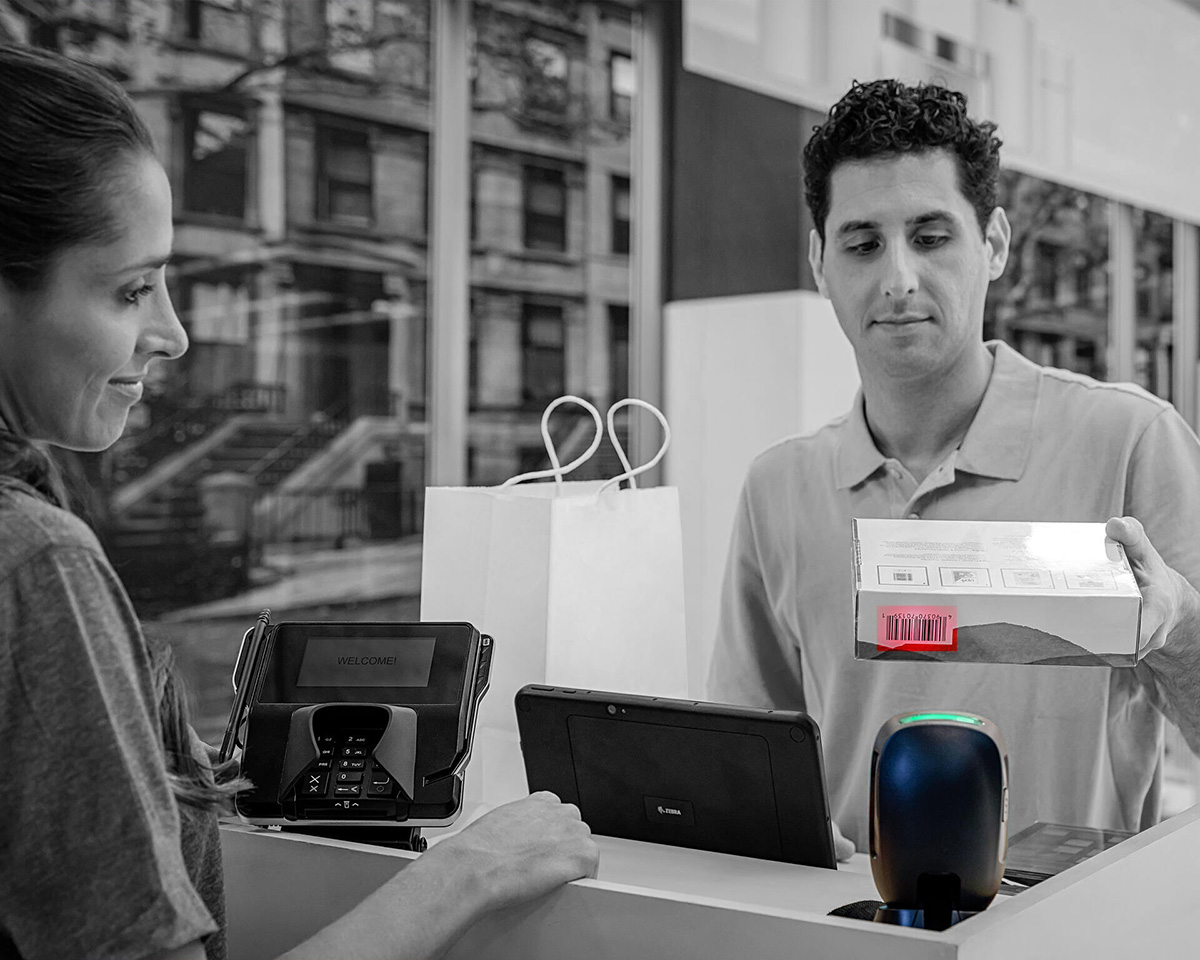 A retailer is using SCANNER to scan the parcode from the product