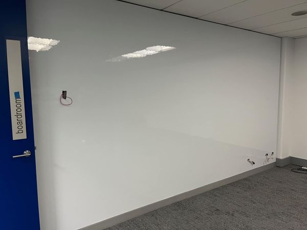 large whiteboard on wall